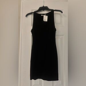 Black boat neck mini dress